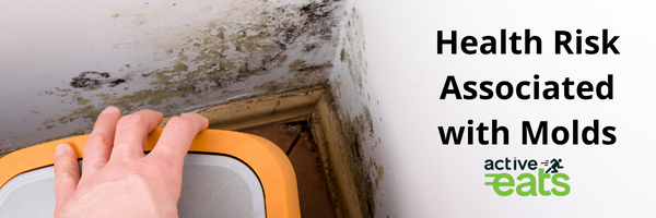 Image showing mold hidden behind carpet and near wall corners and text written "Health Risk Associated with Molds"