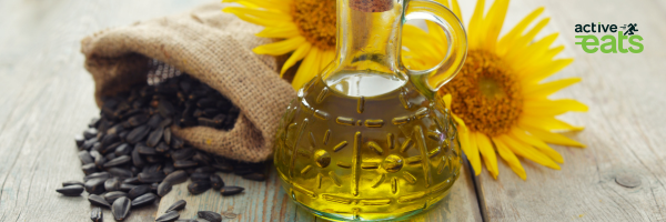 Image showing sunflower oil with sunflower seeds