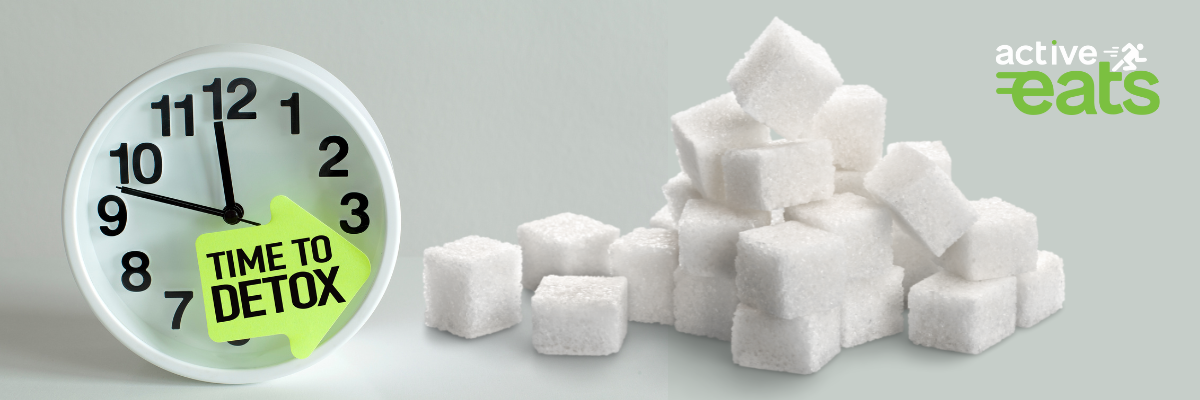 image showing a clock and sugar cubes next to it which indicates that it is time to detox