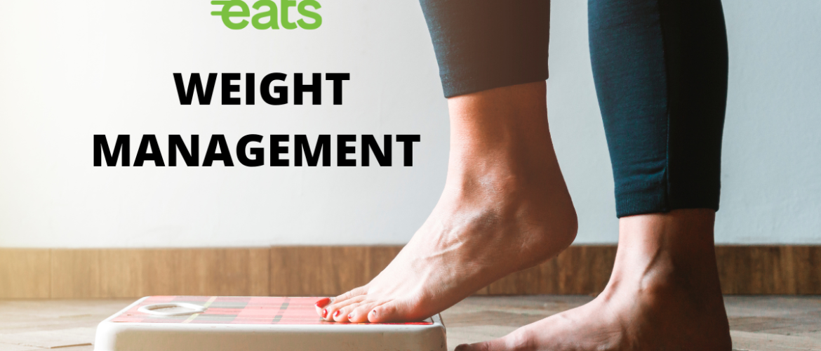 Image showing a foot about to step on a weighing machine.